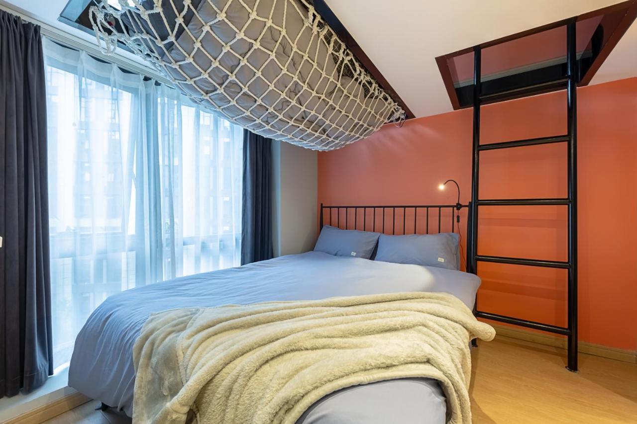 Loft Apartment With Slide Hammock With Movie Viewing Hangzhou Exterior foto